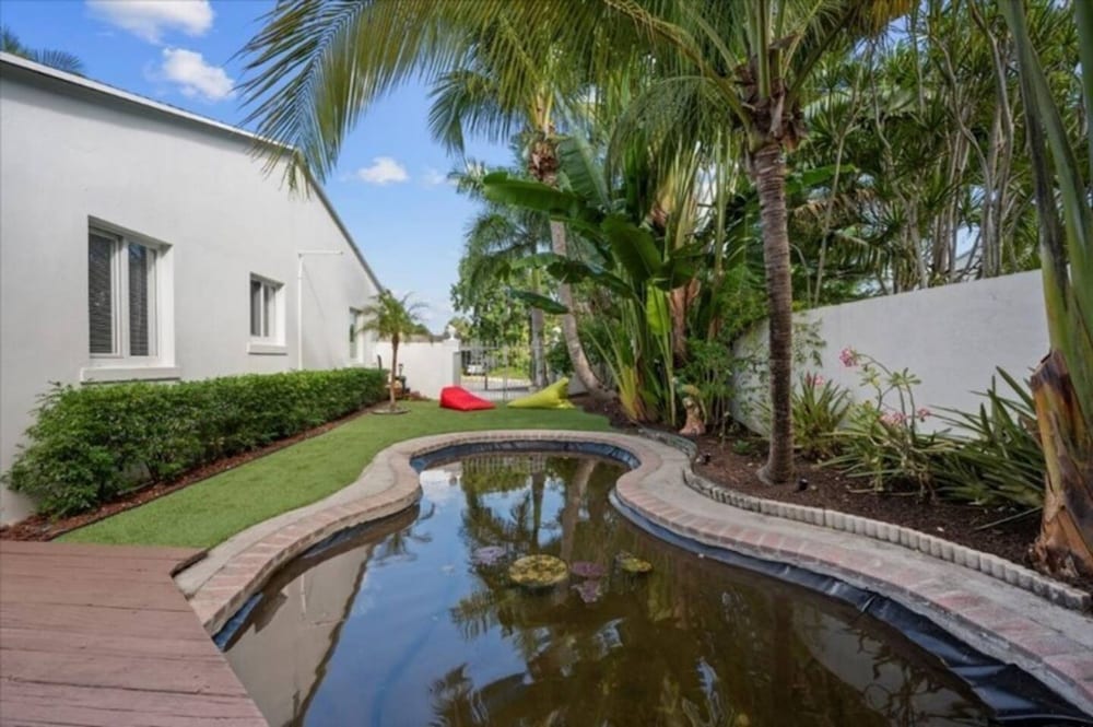 Koi Pond Oasis Near Beach Downtown