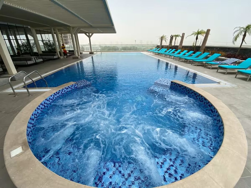 Vogue Novotel JVT near Springs Souk Mall