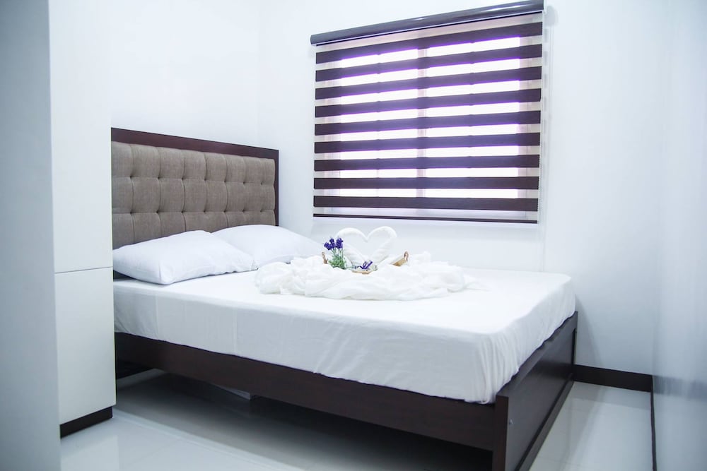 V and G Suites Limay