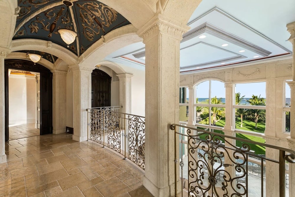 Luxurious 3-story Estate With Gym Pool Slide Private Beach and Lighthouse Views