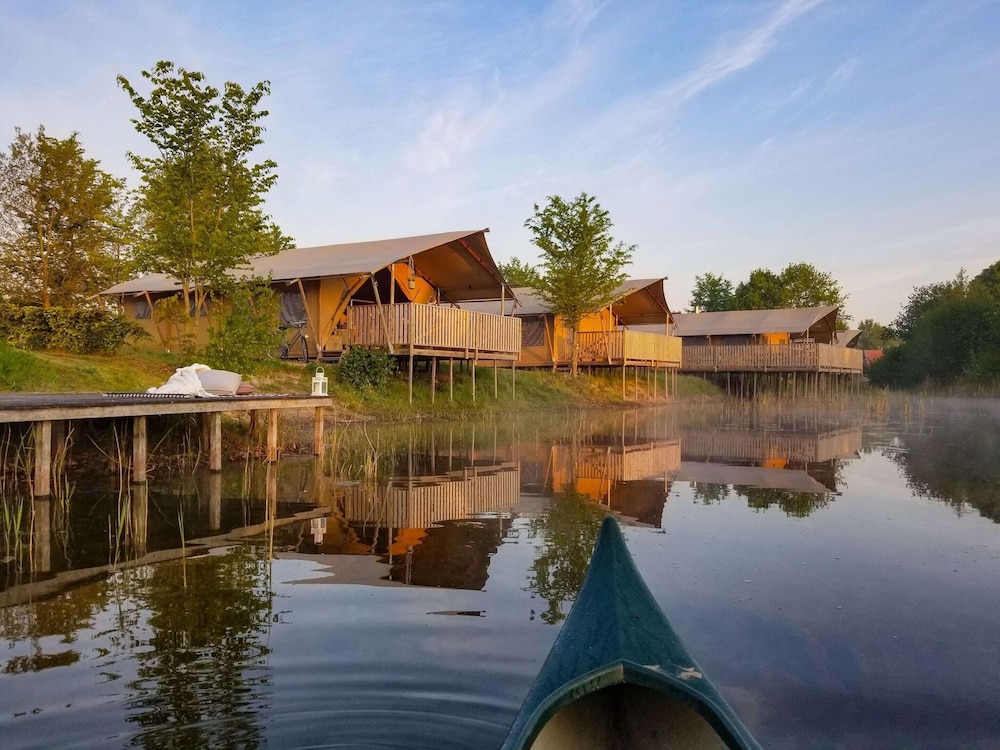 Campsite - Combined Tents With Kitchen and Bathroom Located Near a Pond