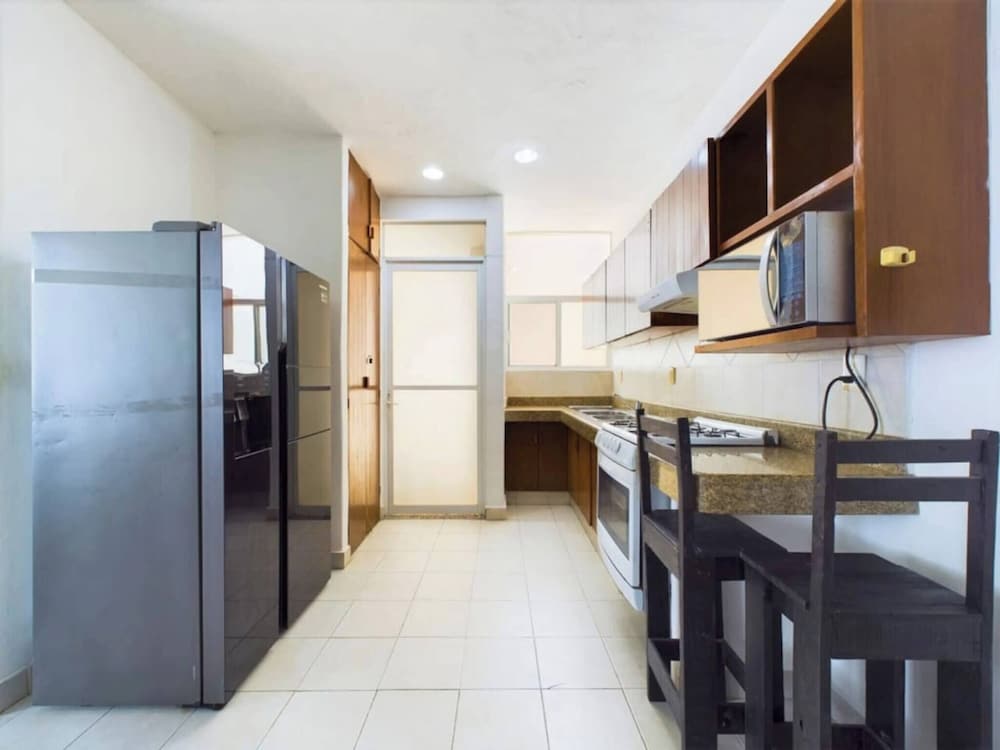 Stylish 2BR Retreat With Private Patio