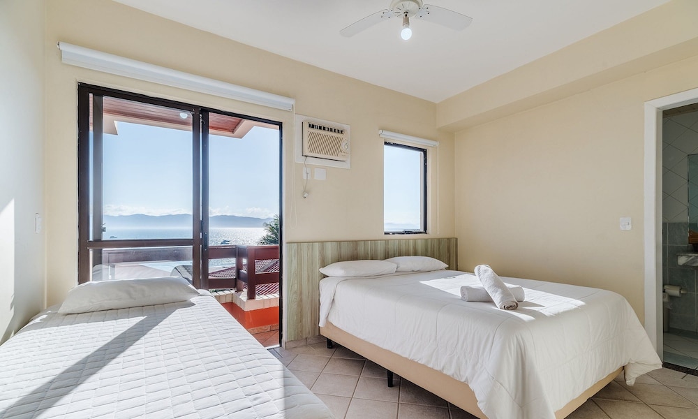 JOFs Apartamentos c Piscina e Vista Mar
