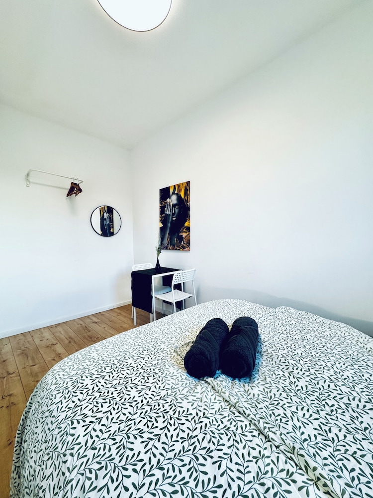 Central 8BR Stay with Garden and Terrace