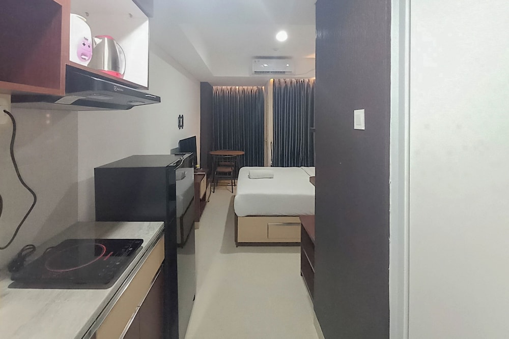 Brand New and Homey Studio at Tamansari Skylounge Makassar Apartment