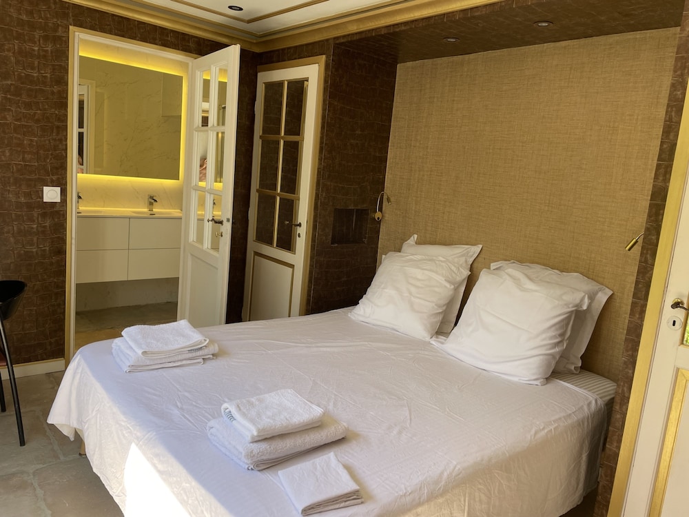 Chambre Luxe Piscine Jardin vue Solarium Palmeraie