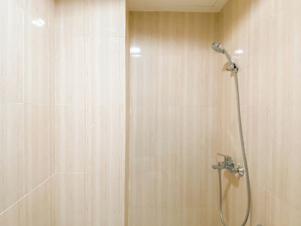 Warm and Cozy 1BR without Living Room at Sentul Tower Apartment
