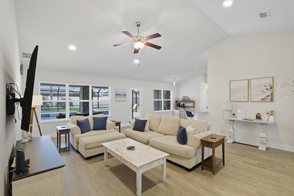 Modern 4BR Retreat Near Beach Heated Pool