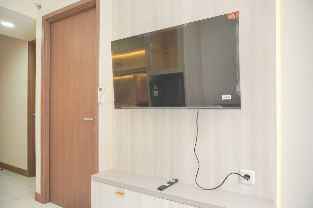 Minimalist and Restful 2BR at Podomoro Golf View Apartment