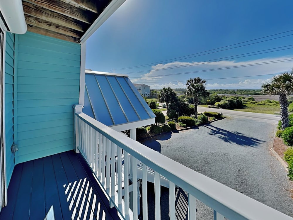 Blue Me A Wave by Topsail Realty