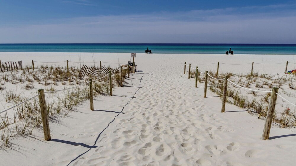 Beachfront Charm Meets Lake Life + Free Tickets: Dolphin Cruise & More!