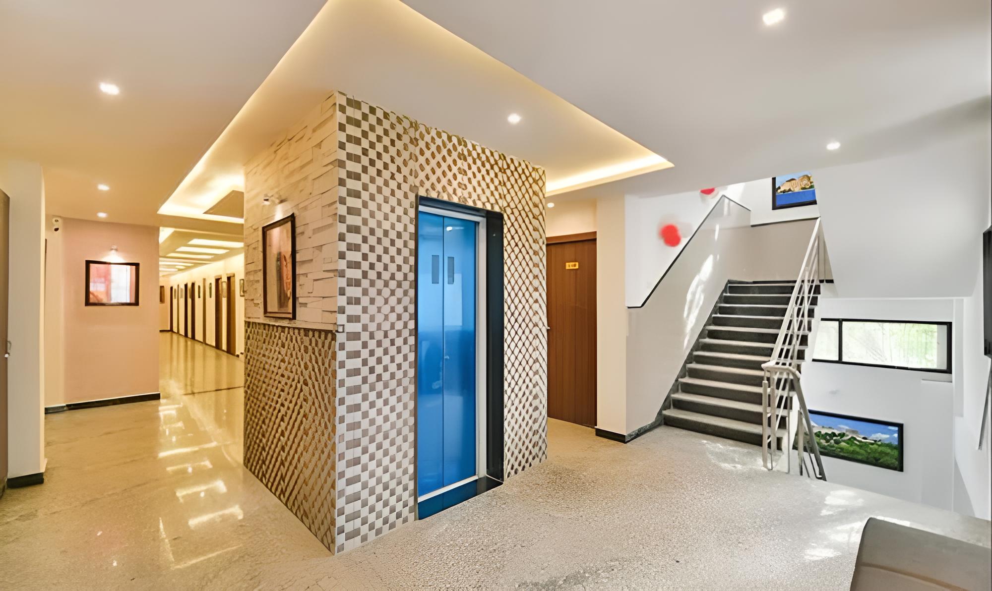 Fabhotel Prime Golden Feather