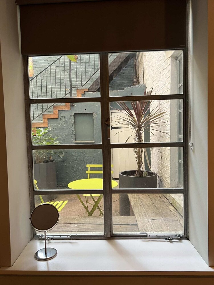 Stylish 2 Bedroom Converted Victorian Storefront