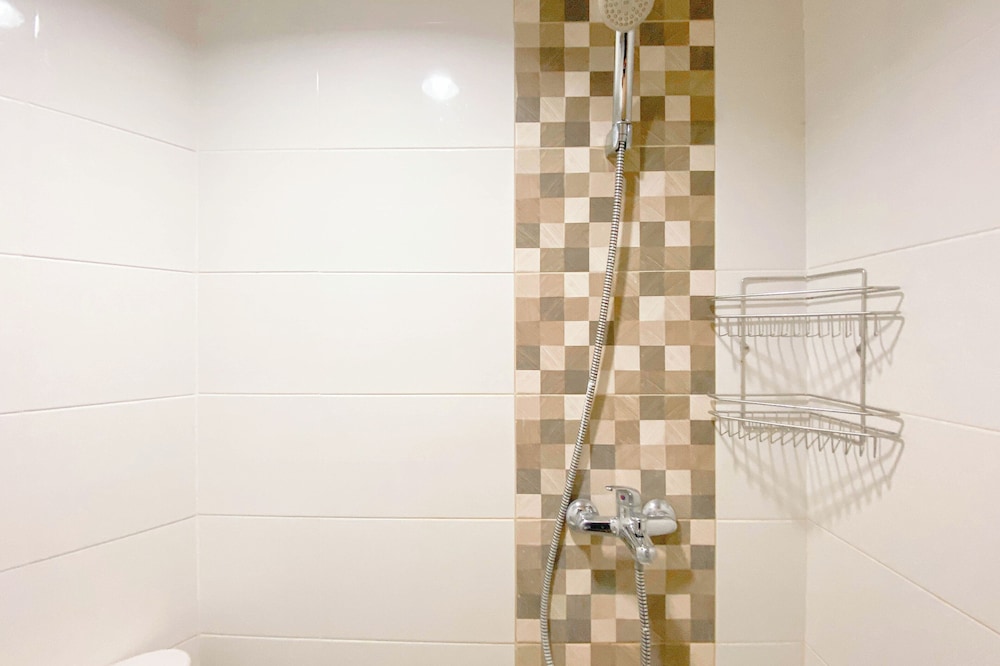 Simple White Studio Apartment At The Alton Semarang