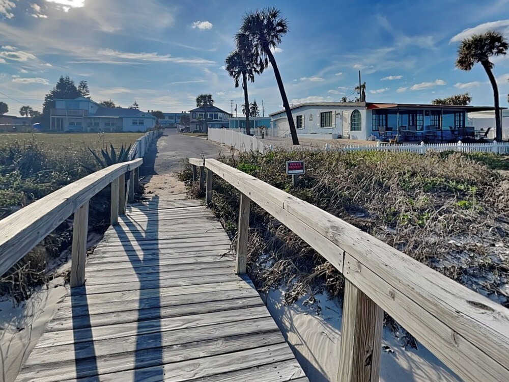 Bathing Suit Beach Bungalow by Distinctive Beach Rentals