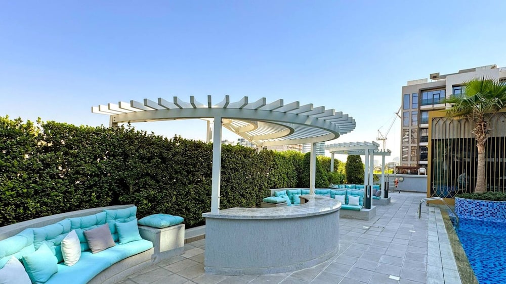 Stylish 1BR Apt w Pool in JVC nr Dubai Sports City