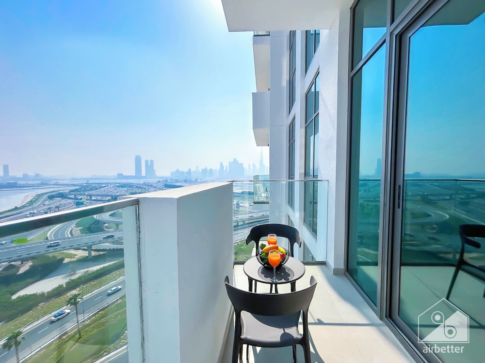 Cozy 1BR With Balcony & Views in Azizi Fawad