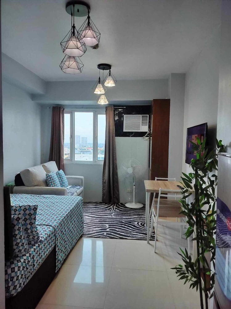 Cozy Studio Unit in Quezon City With Private Pool and City Views