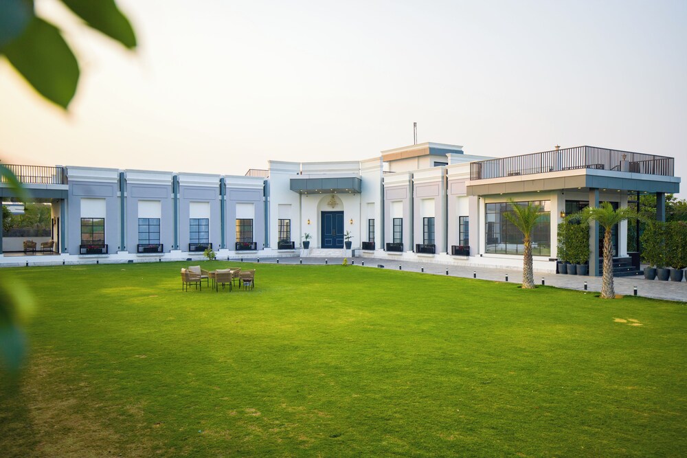 ELIVAAS Ibiza Luxe 4-BHK Farmhouse