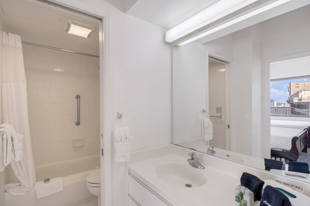 Waikiki Banyan Condo Located One Block From Waikiki Beach! by Koko Resort Vacation Rentals