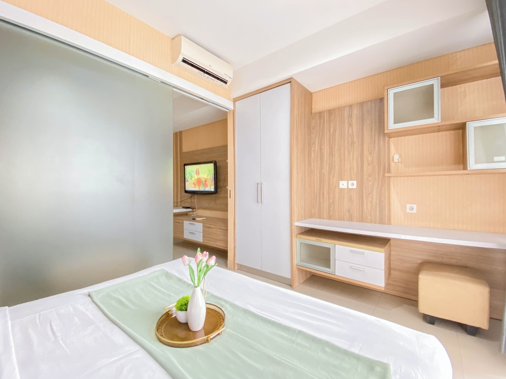 Homey and Comfortable 1BR Apartment at Dago Suites