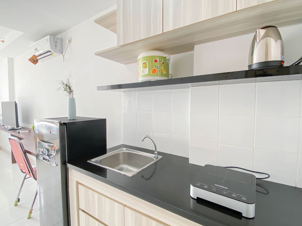 Basic Studio Room At Azalea Suites Apartment