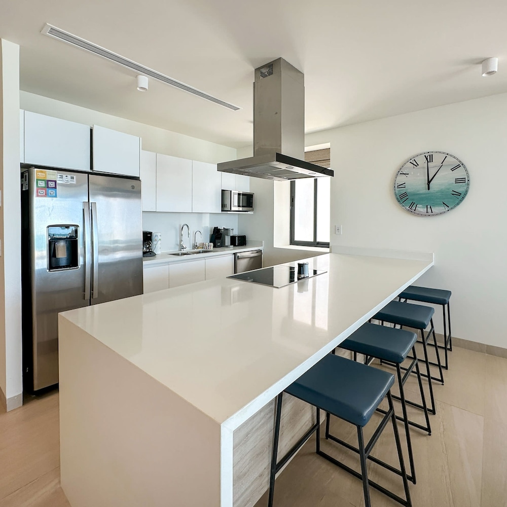 Brand-new Modern 2BR Gem on Iconic Sandy Beach