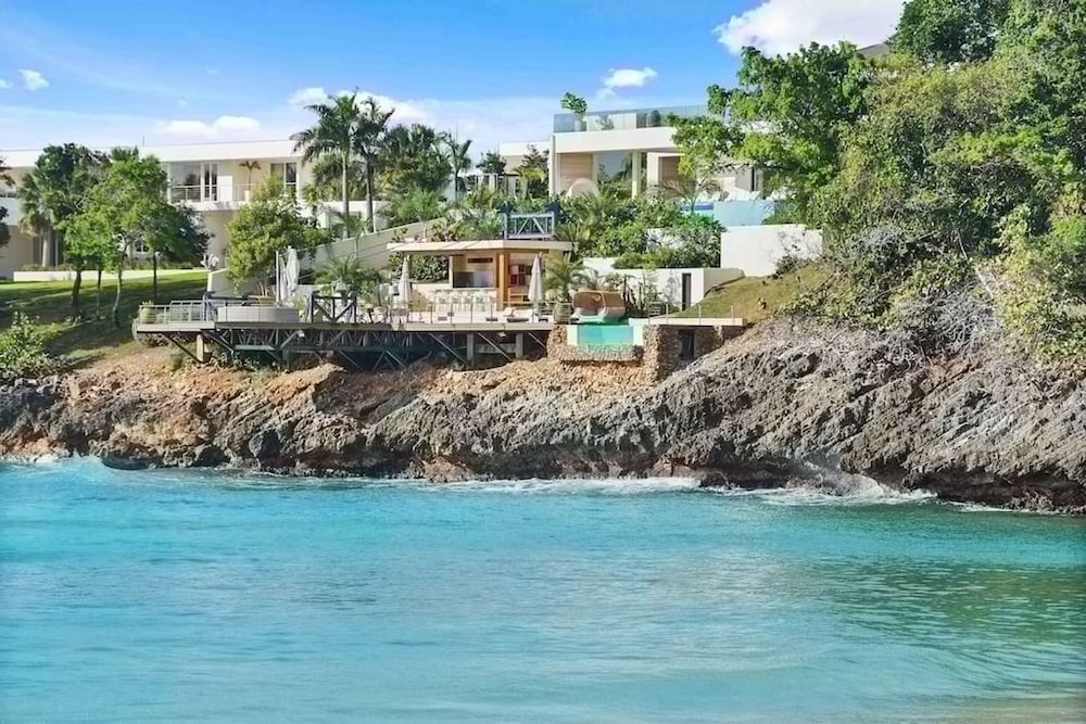 Gorgeous Beach House Perched Right Over the Ocean