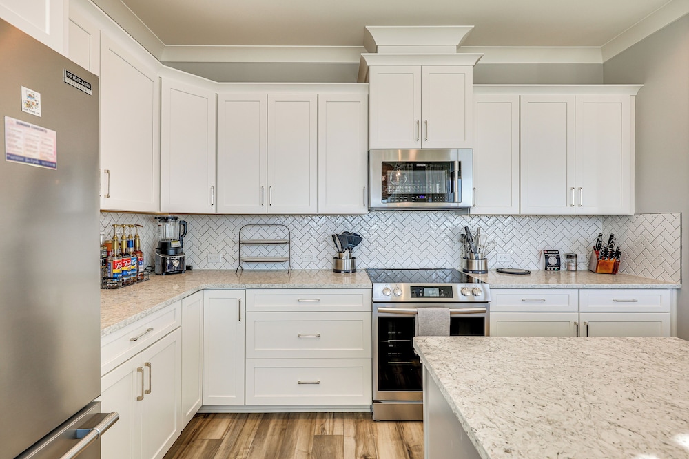 Walk to Beach: Coastal Oak Island Gem w/ Elevator!