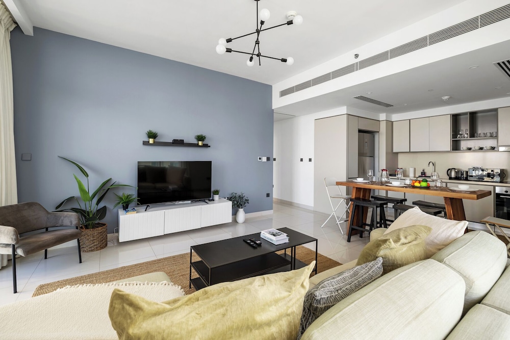 2BR Beachfront Retreat with Palm Views