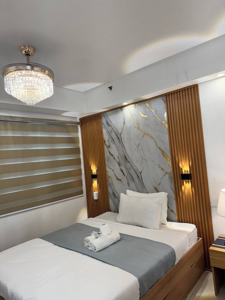 Relax in Pasay City's Best Kept Secret - Spacious Condo With Garden View