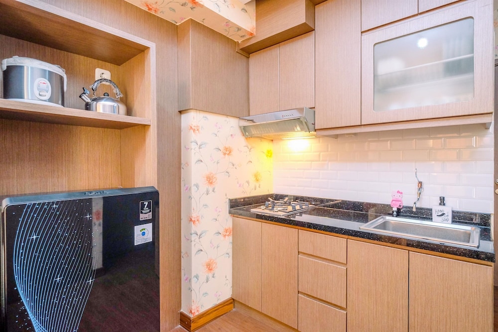 Homey and Modern 2BR at Podomoro Golf View Apartment