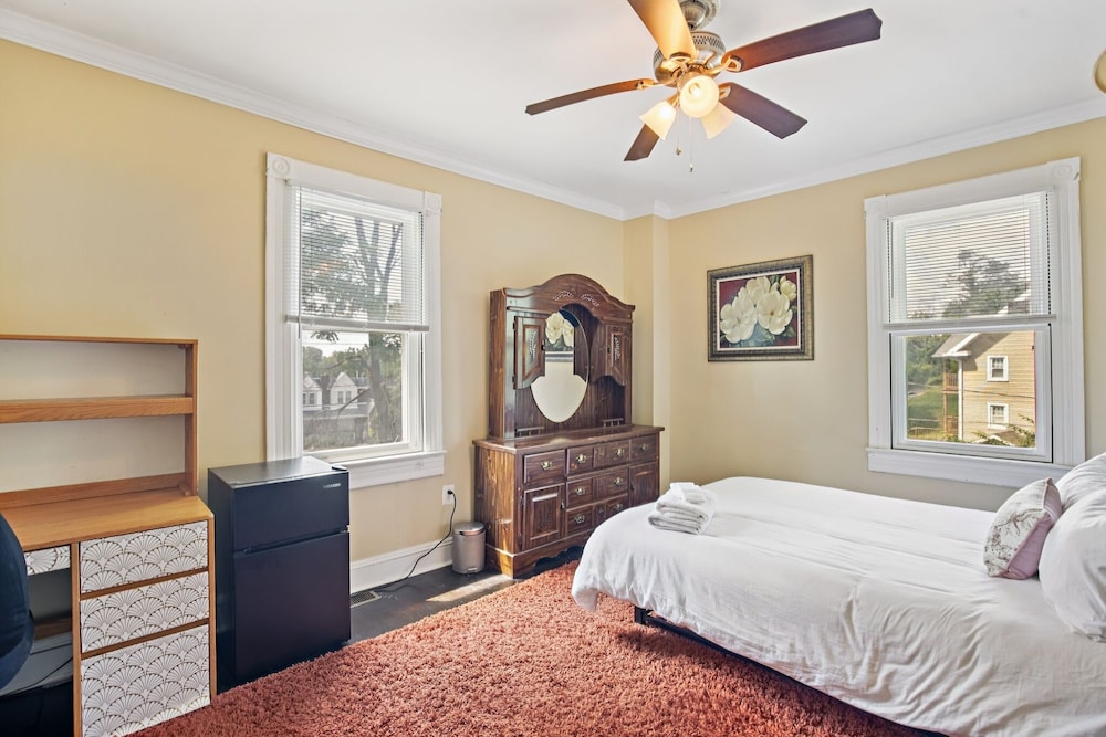 Charming Victorian Home With Porch & Large Yard 7 Bedroom Home