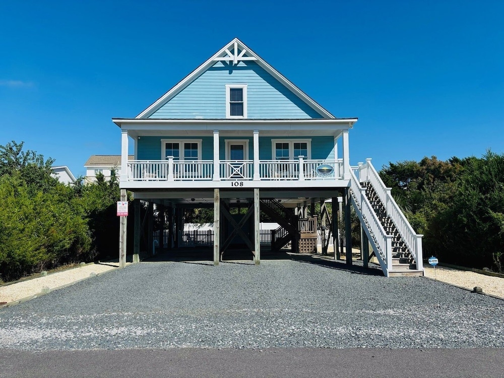 Blue Sunset 4 Bedroom Home by RedAwning