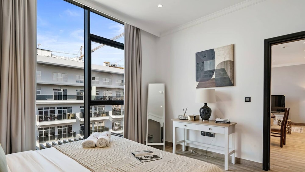 Stylish 1BR Apt w Pool in JVC nr Dubai Sports City