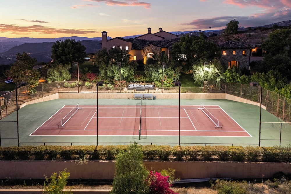 Infinity Pool, Theater, Pickleball + 360 Views Near Lake Poway Sunset Point Estate by Avantstay