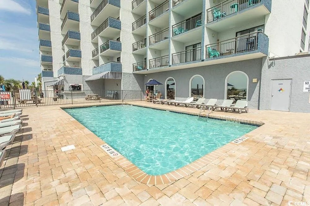 Beachfront Haven 1BR Condo with Balcony
