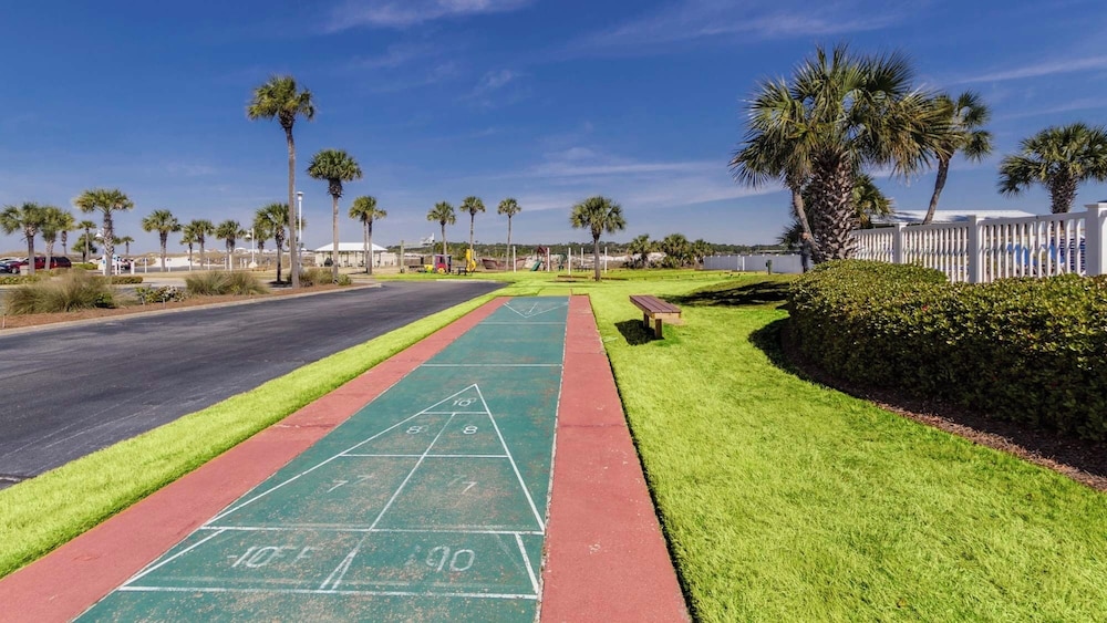 Beachfront Charm Meets Lake Life + Free Tickets: Dolphin Cruise & More!