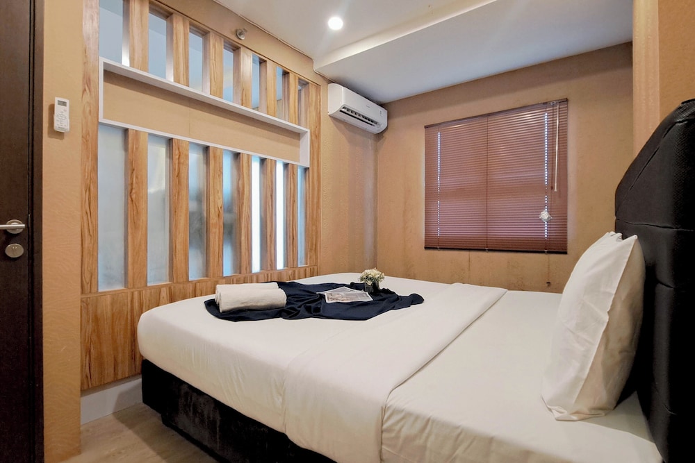 Wooden Accent 2Br At Mekarwangi Square Cibaduyut Apartment