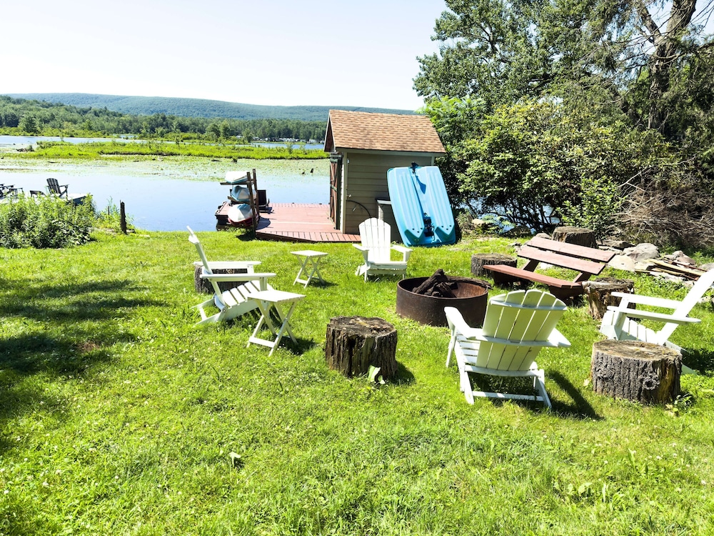 Lakefront A-frame Dock Kayaks Fire Place