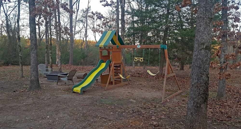 Cast Away Family Cabin with Hot Tub, Fireplace, and Kids Area by RedAwning view 2