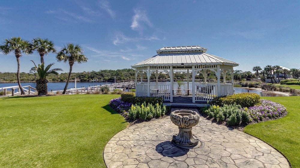 Beachfront Charm Meets Lake Life + Free Tickets: Dolphin Cruise & More!