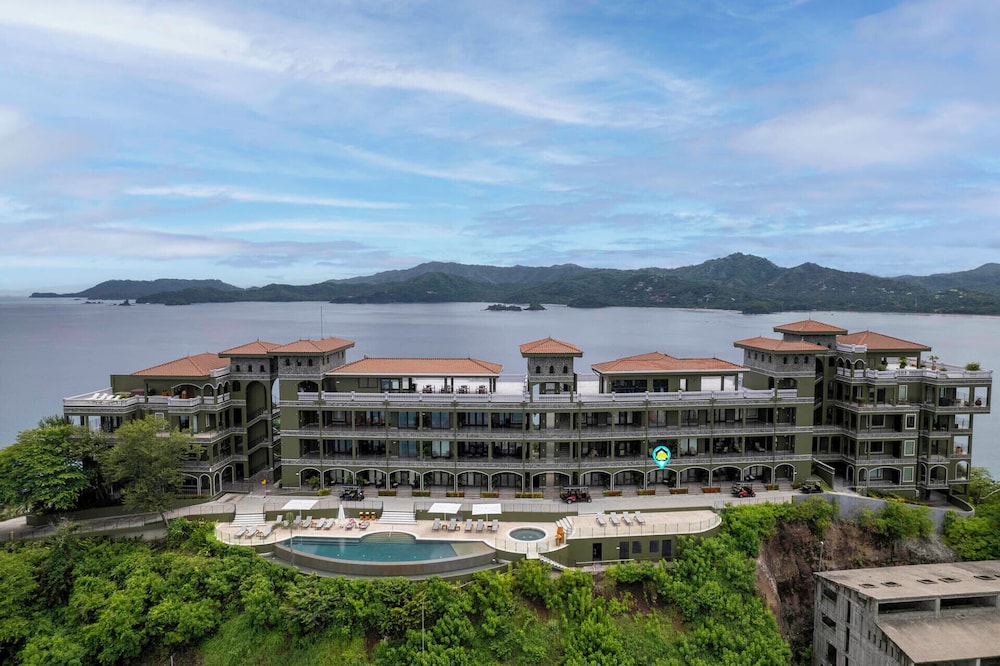 Luxury Condo with Panoramic Ocean Views, Sparkling Infinity Pool, and Modern Open-Concept Design