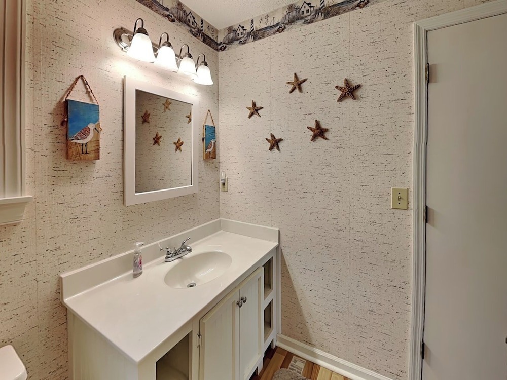 Back A Bit by Topsail Realty