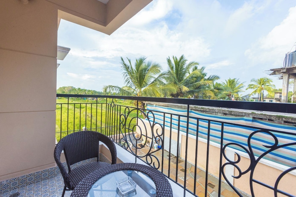 Palm Retreat 1BHK Pool & Field Views
