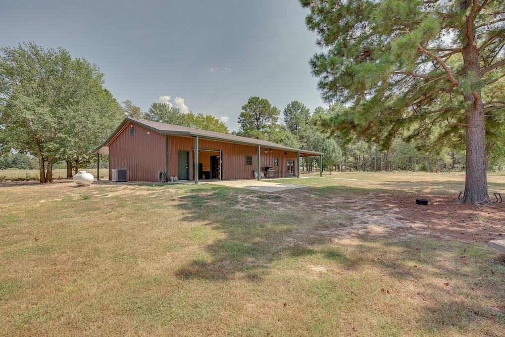 Fire Pit at Dog-friendly Countryside Quitman Cabin view 4