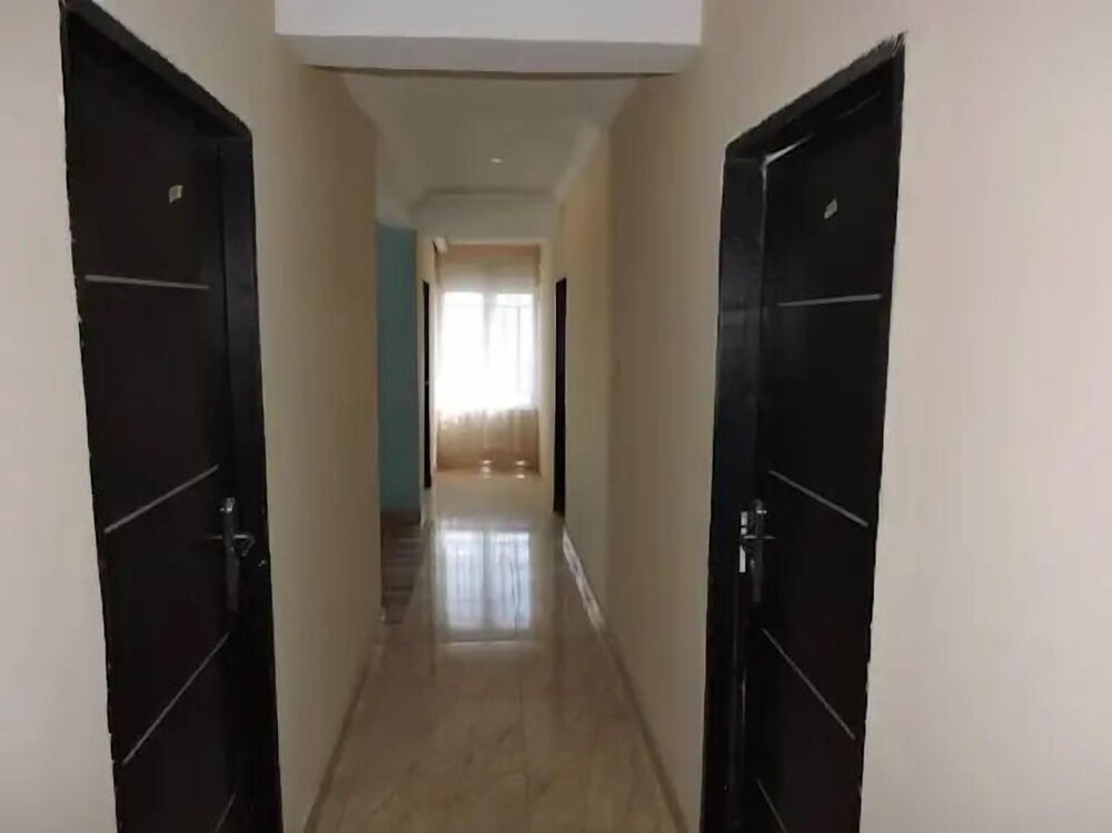 Wig and Gown Apartment
