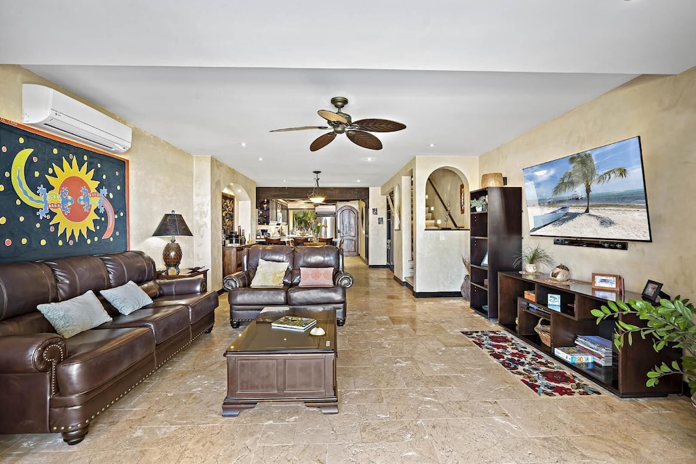 Luxury Beachfront Condo w/ High-End Wood Furnishings and Ocean Views in Exclusive Community view 3