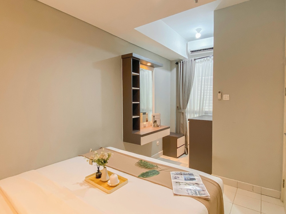 Homey And Modern 2Br At Patraland Urbano Apartment