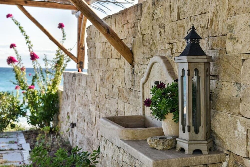 Azure Coast Seafront Retreat by Rentalspro